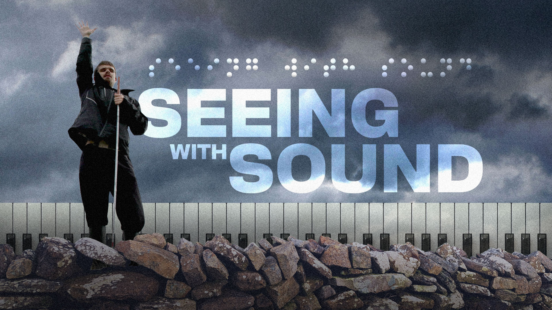 Our Lives: Seeing with Sound title card, showing Ethan standing on a dry-stone wall with his cane raised